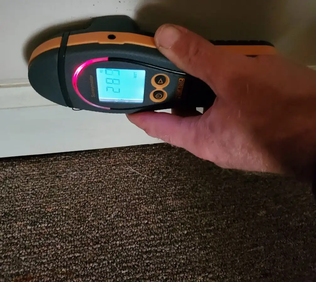 Moisture detection at baseboard during Storm Damage Restoration in Wawarsing